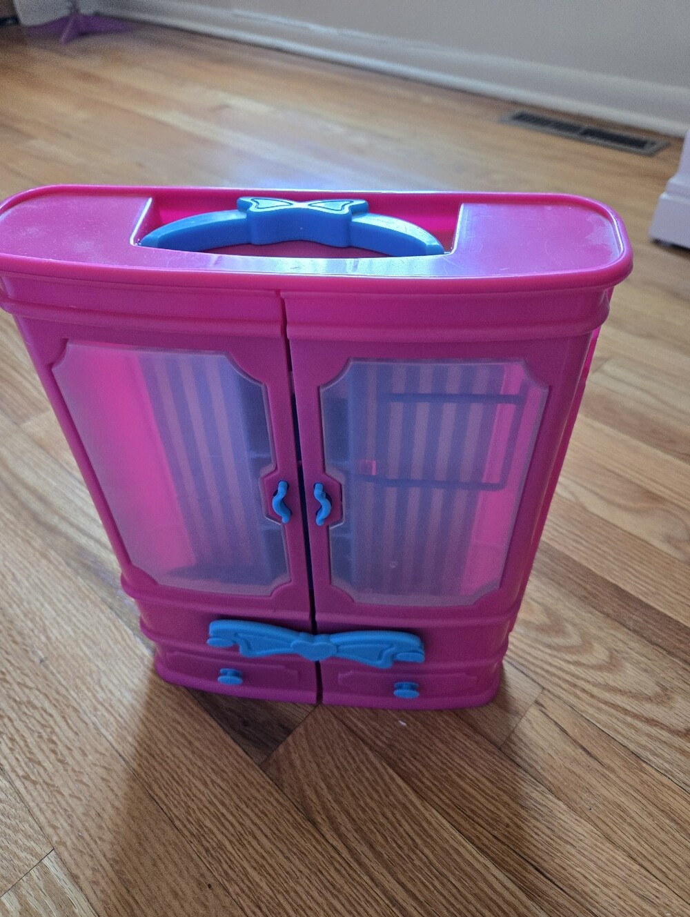Pink and Blue Plastic Doll Wardrobe